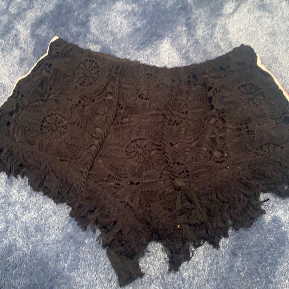 Black detailed shorts with stripe down side